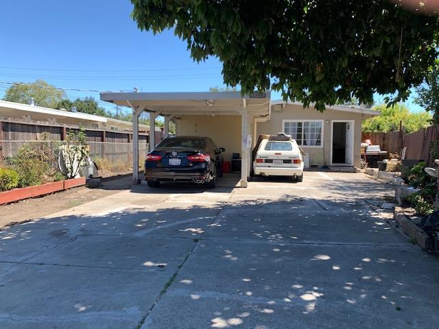 Welcome to this amazing opportunity! Imagine owning 1310 sf of living space.  It is currently modeled as a 3 bedrooms and 1 bathroom.  When the night falls, one does not have to worry about parking during the night, because this property comes with plenty space for several cars, and RV possible, That's a big "WOW"!   Located minutes of walking distance to Facebook, easy access to freeway, and a short drive to fine dining and shopping. Come view it, and fall in love with this amazing-one of a kind opportunity.
