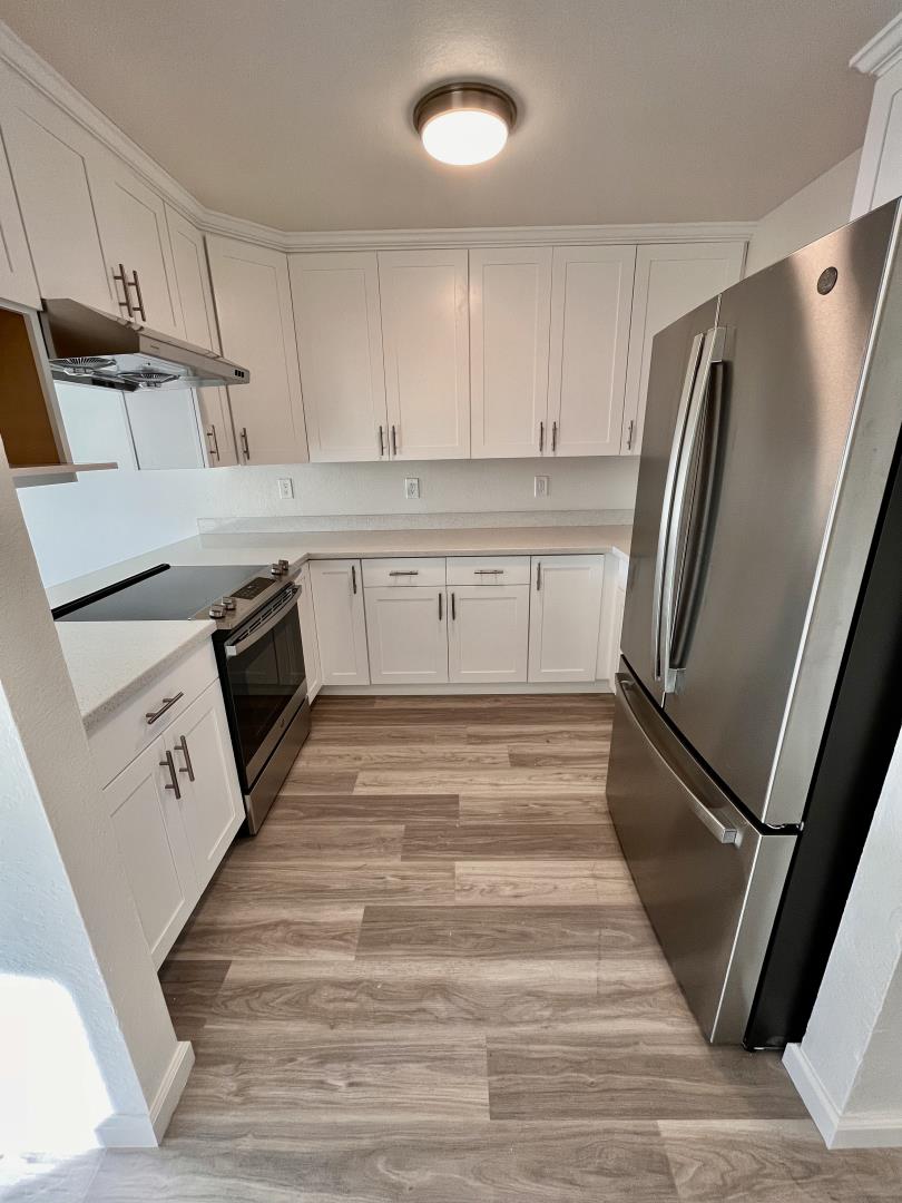 Completely remodeled unit with high end finishes. Including brand new stainless steel appliances, sleek cabinets, quartz countertops. Condo is in a gated building, including a parking garage; walking distance to Bart! Come quick, you can't build yourself for such low price! Low HOA covers water, garbage, and insurance. If Rental, 8%+ return.