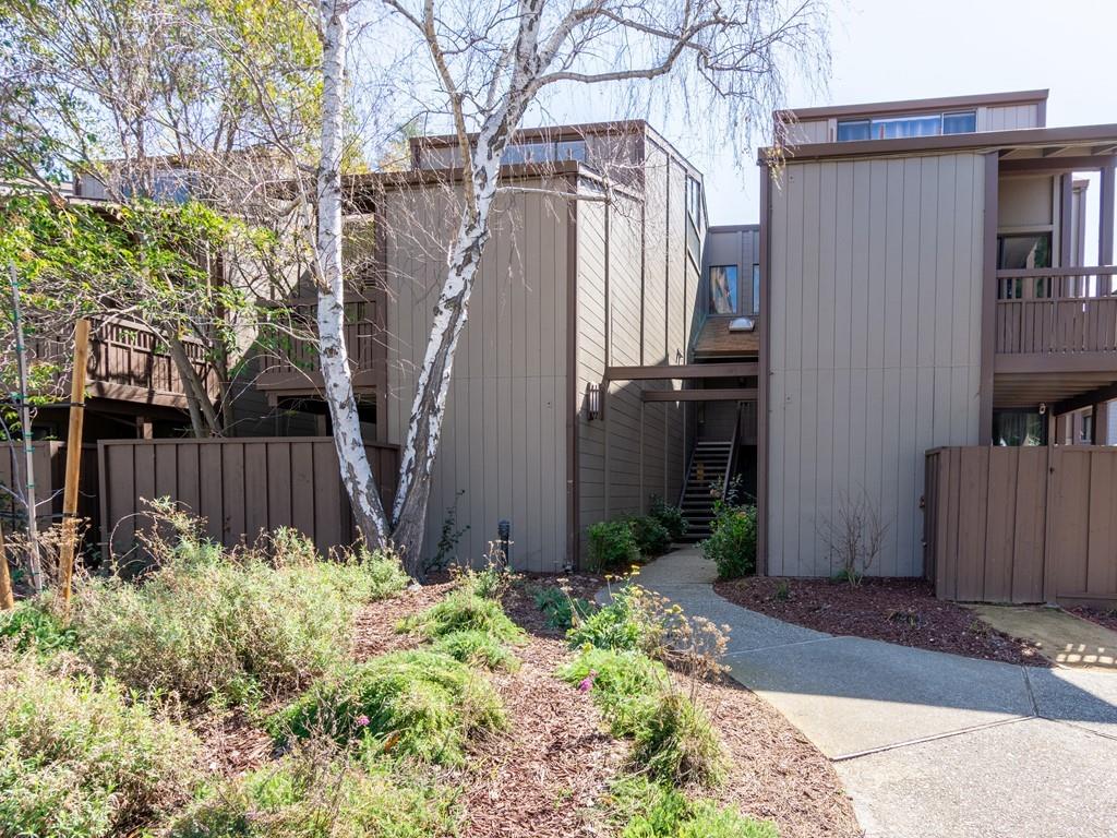 Conveniently located in the heart of Silicon Valley and minutes from Google, downtown Mountain View, and commute routes, this spacious two-level condo of nearly 2300 square feet has 3 bedrooms and 3 full bathrooms. The floor plan features a master suite on the first floor and another on the second floor along with an eat-in kitchen and upstairs loft, perfect for a home office! Just off the living and dining areas with high vaulted ceilings and a beautiful wood beam and fireplace, is a spacious outdoor balcony overlooking the association pool. There is also another balcony off of one of the bedrooms toward the front of the unit.