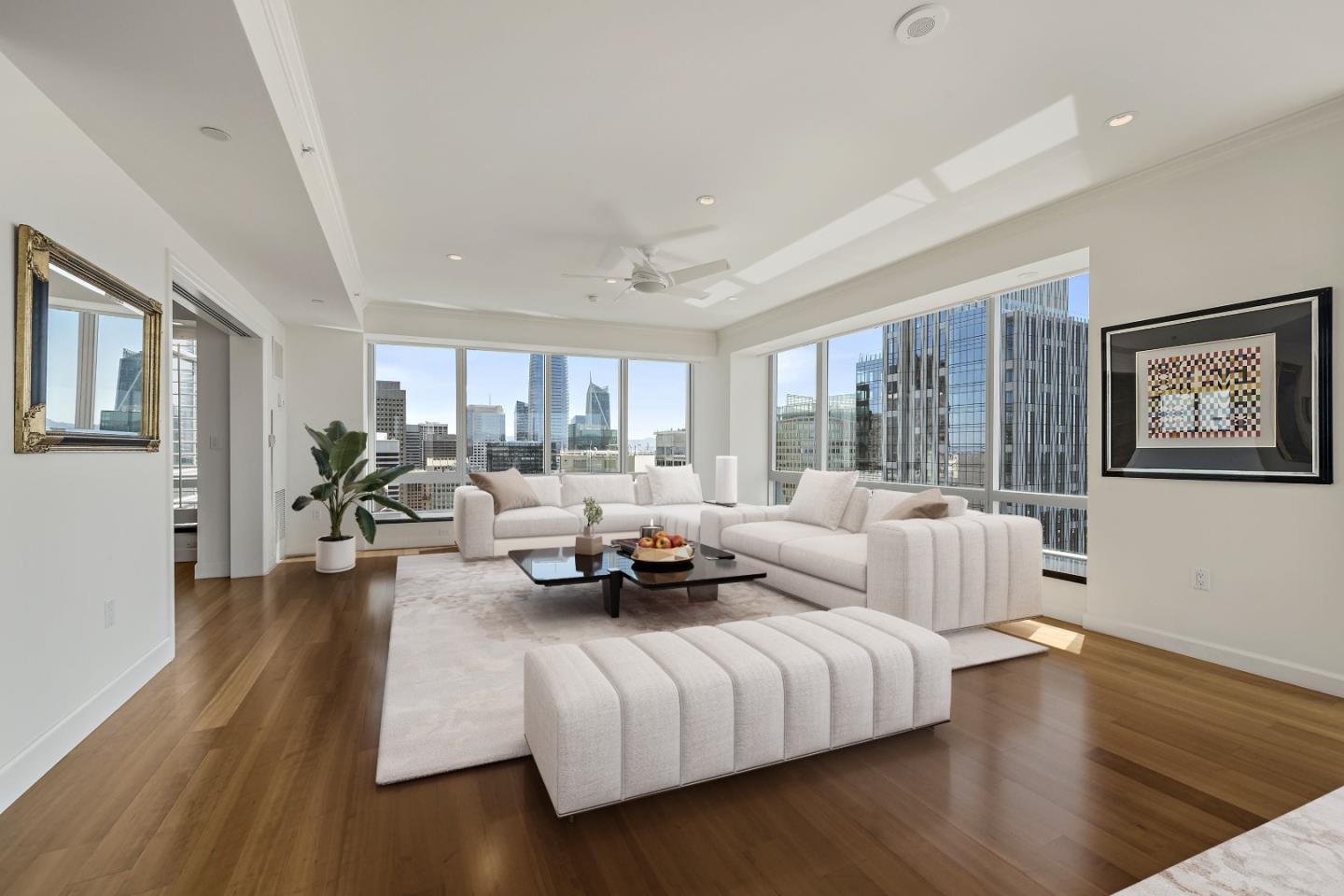 This unique, ultra-spacious penthouse is a Four Seasons Residence, renowned for luxury amenities and service. One of the largest in the building, this one-level condominium spans more than 4,300 square feet with 270-degree unique city views. A private, 24-hour concierge service with three private entrances from the hallway allowing ultra-convenience for guests or staff. The open design is wrapped with breathtaking views with ceilings that delineate spaces for lounging and dining extending from the open gourmet kitchen. A dedicated office and built-in maple cabinetry with matching desk. Primary suite includes a granite-finished steam room, marble bath with heated floor, and air jet tub. A junior suite with studio design integrates a kitchen with cooking facilities and private lobby entrance. There are two deeded parking spaces. This Four Seasons residence has five-star amenities which include access to an onsite Equinox Fitness Center and MKT Restaurant.